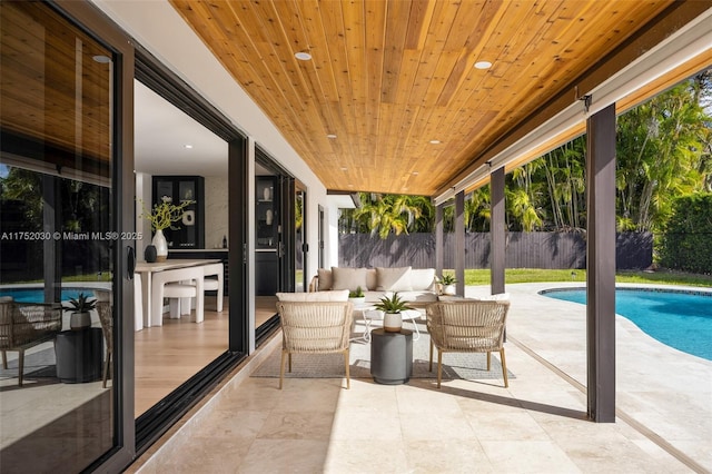 view of patio / terrace featuring a fenced in pool and a fenced backyard