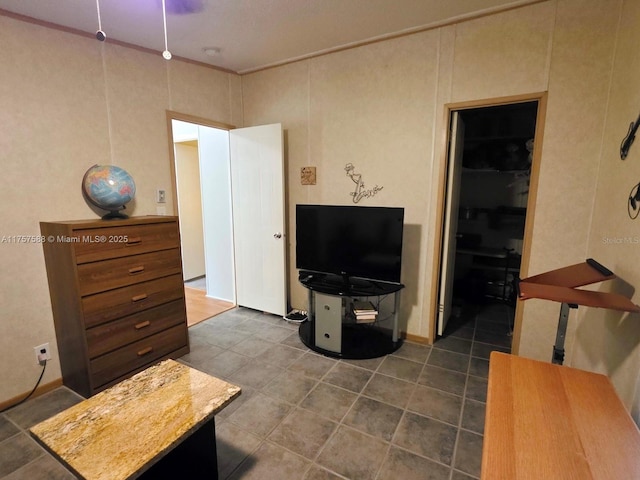 living room with dark tile patterned floors
