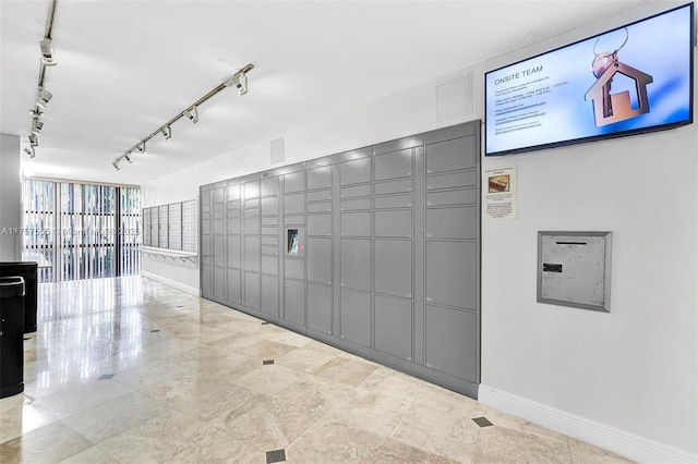 view of community featuring mail area and a package area