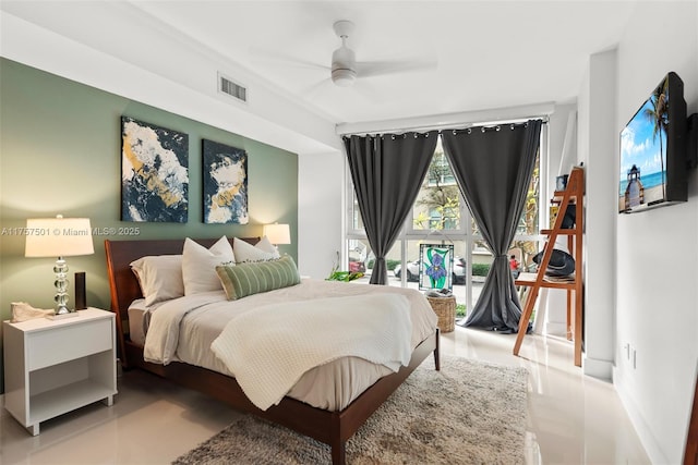 bedroom with ceiling fan and visible vents