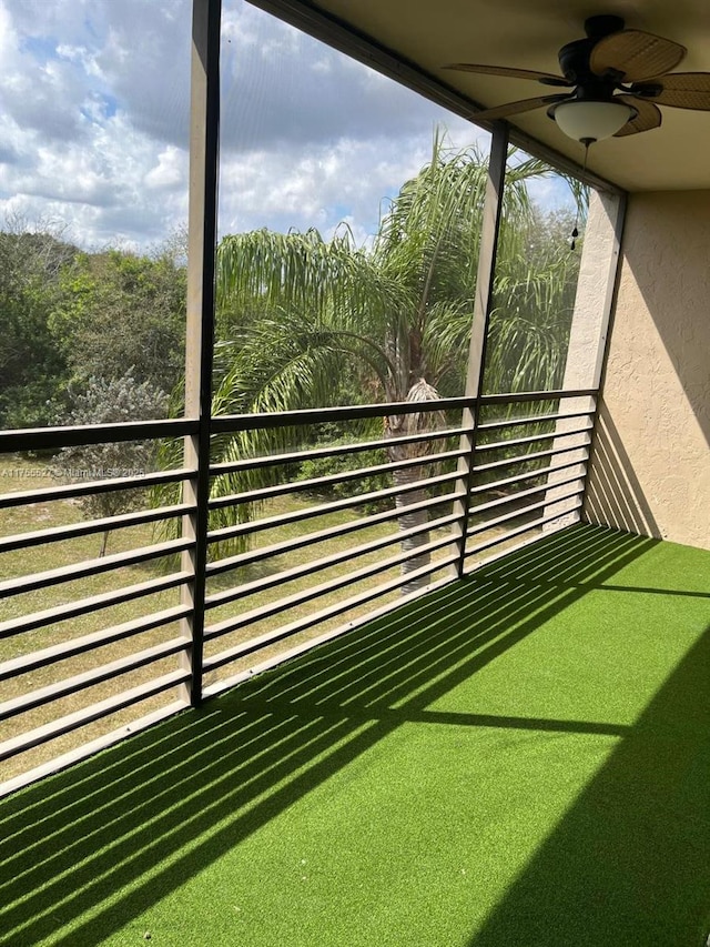 balcony featuring ceiling fan