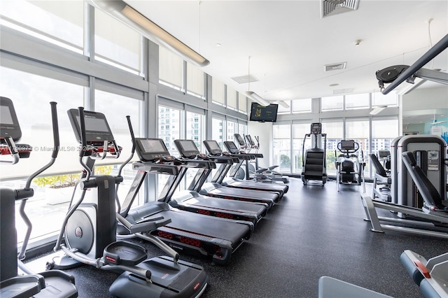 exercise room featuring visible vents