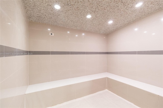 interior space with tile patterned flooring and recessed lighting