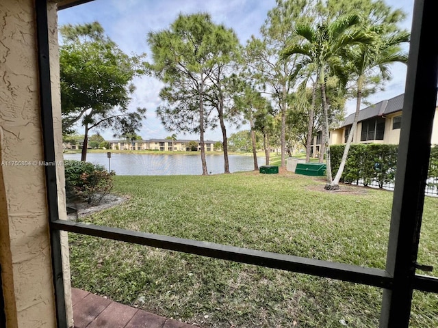 view of yard with a water view