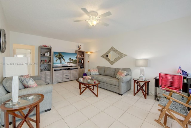 living room featuring a ceiling fan and light tile patterned flooring