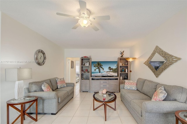 800 SW 11th Ave Unit 9A, Hallandale Beach, FL 33009 - living area with a textured ceiling, light tile patterned flooring, and ceiling fan with notable chandelier