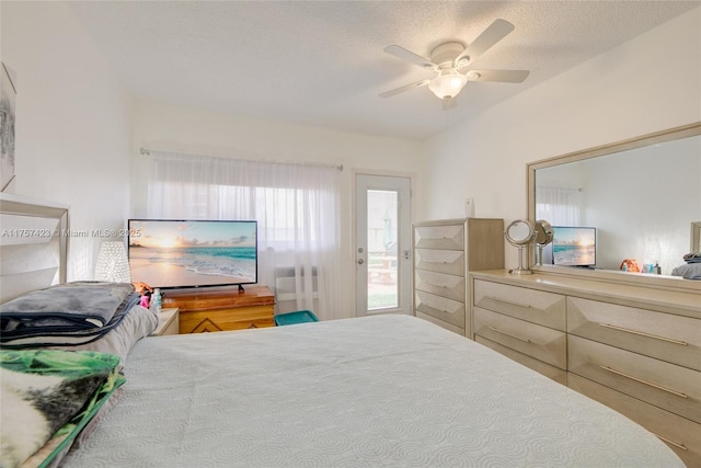 800 SW 11th Ave Unit 9A, Hallandale Beach, FL 33009 - bedroom with a textured ceiling, lofted ceiling, and ceiling fan