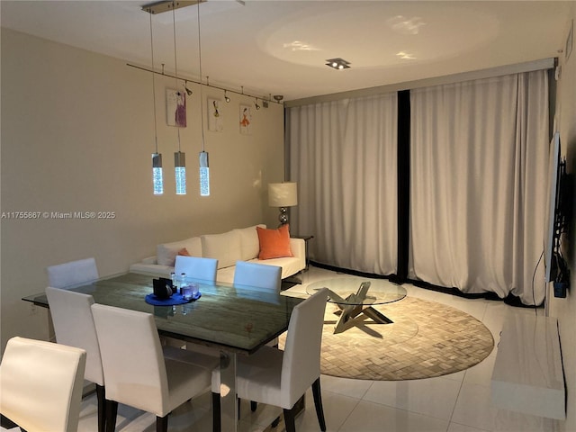 dining room with light tile patterned floors