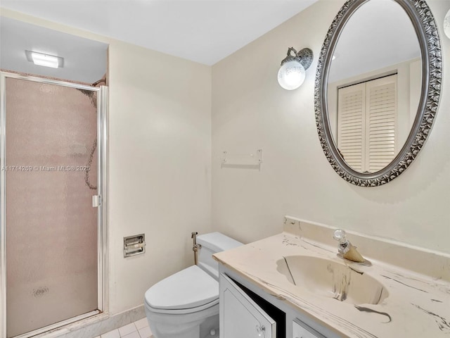 full bathroom with vanity, tile patterned flooring, a shower stall, and toilet