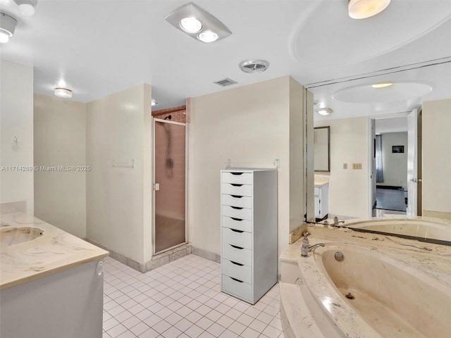 bathroom with tile patterned floors, visible vents, vanity, a shower stall, and a bath