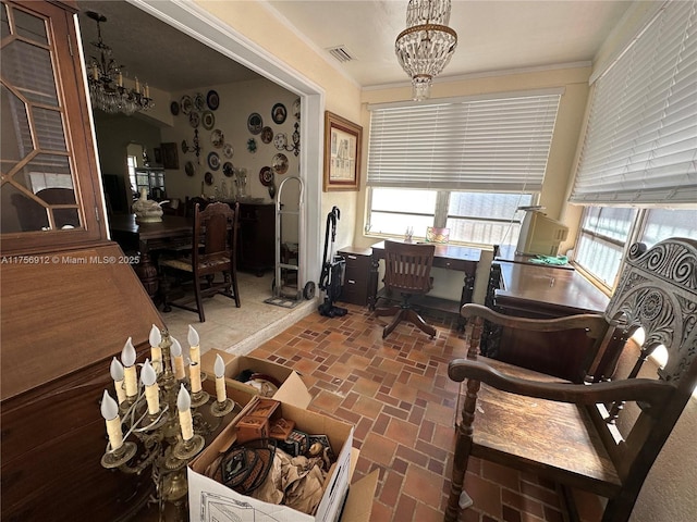 living area featuring arched walkways, brick floor, a notable chandelier, visible vents, and ornamental molding