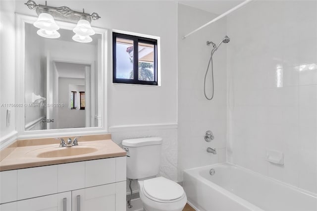 full bathroom with shower / washtub combination, vanity, and toilet