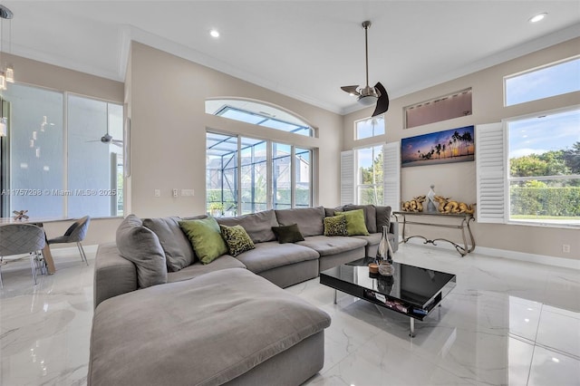 living area with ceiling fan, marble finish floor, recessed lighting, and crown molding