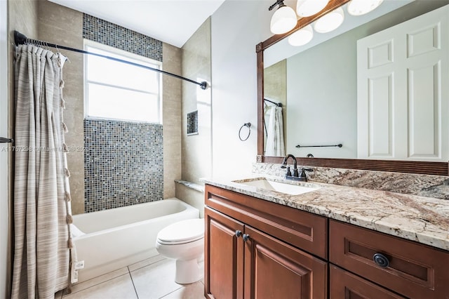 full bathroom with toilet, tile patterned flooring, shower / bathtub combination with curtain, and vanity