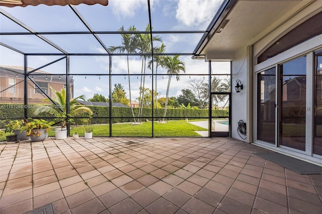 view of patio with a lanai