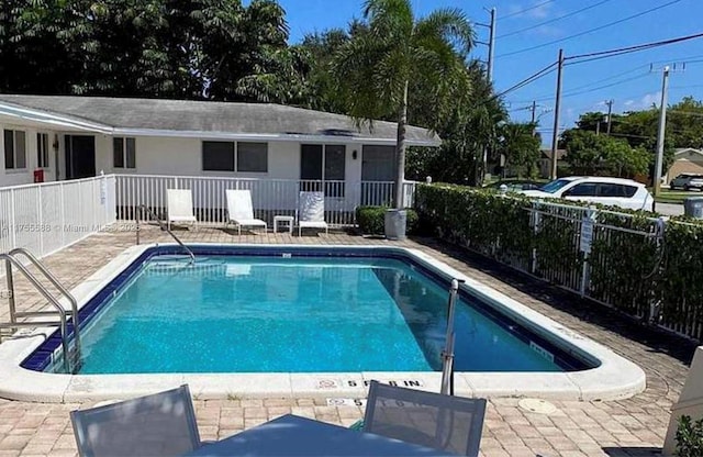 pool featuring fence