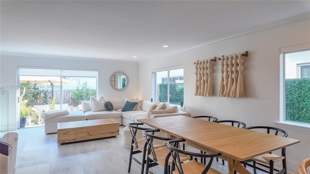 dining area featuring ornamental molding and recessed lighting