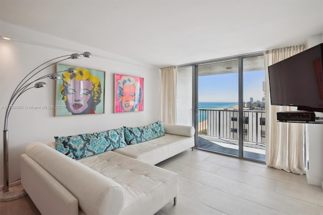 living area with floor to ceiling windows