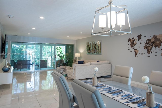 dining area with a chandelier and recessed lighting