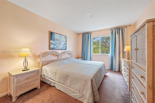 carpeted bedroom with a textured ceiling