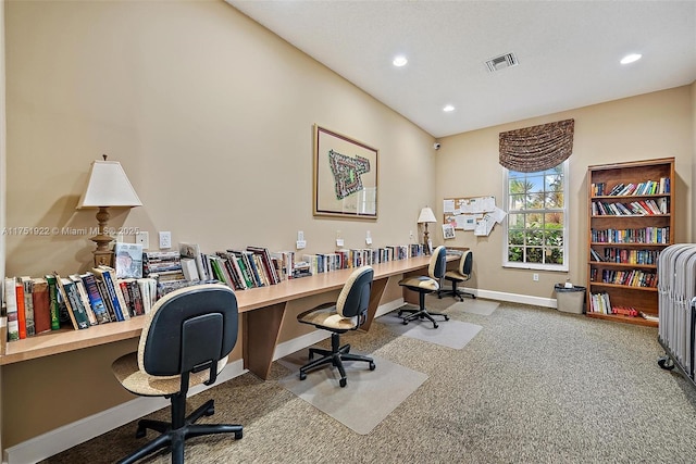 office area with recessed lighting, carpet floors, visible vents, baseboards, and built in study area