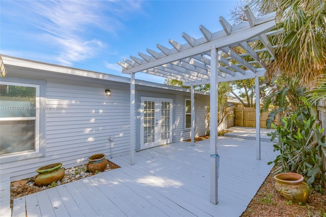 wooden deck with fence and a pergola