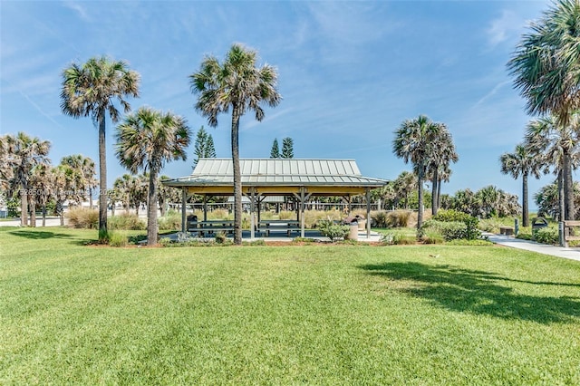 view of community featuring a yard and a gazebo