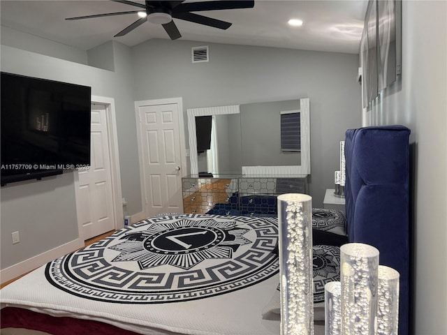 bedroom with visible vents, vaulted ceiling, baseboards, and ceiling fan