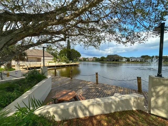 exterior space with a dock