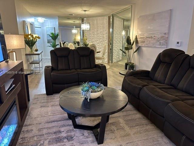 living room with wood finished floors