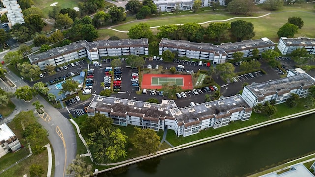 bird's eye view featuring a water view and golf course view