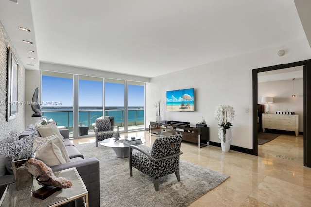 living room featuring expansive windows, marble finish floor, and baseboards