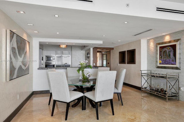 dining space featuring visible vents, baseboards, and recessed lighting