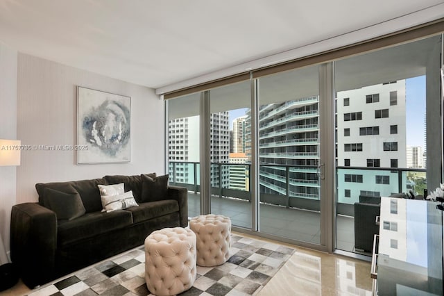 living area with floor to ceiling windows and a city view