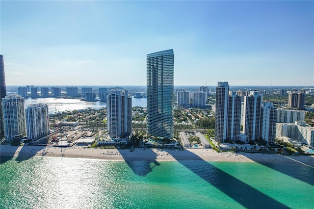 exterior space featuring a view of city and a water view