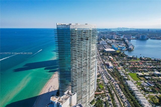 bird's eye view featuring a water view and a city view