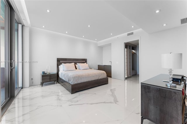 bedroom featuring marble finish floor, visible vents, and recessed lighting