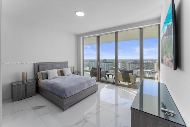 bedroom featuring access to exterior and marble finish floor