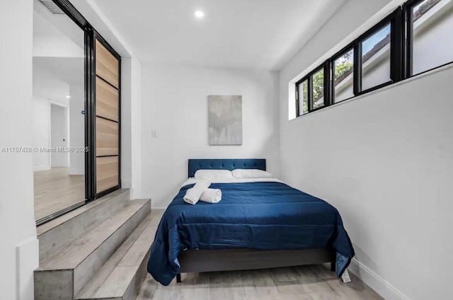 bedroom with visible vents and baseboards