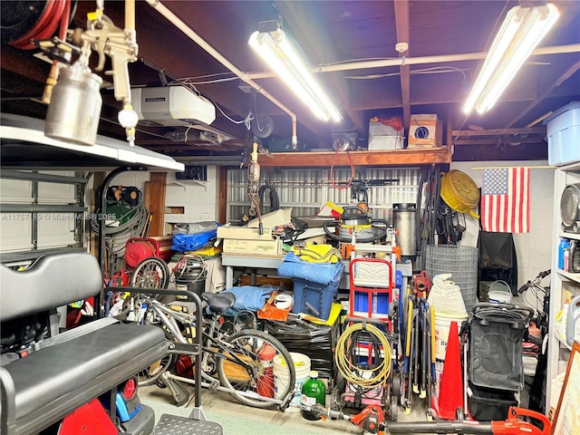 garage with bike storage and a garage door opener