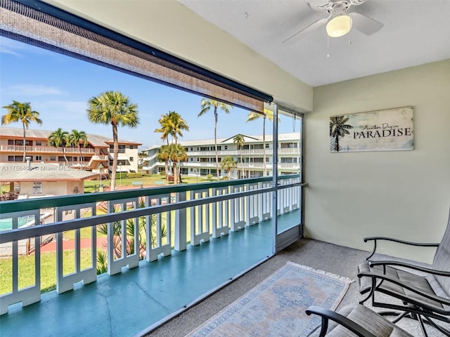 balcony featuring ceiling fan