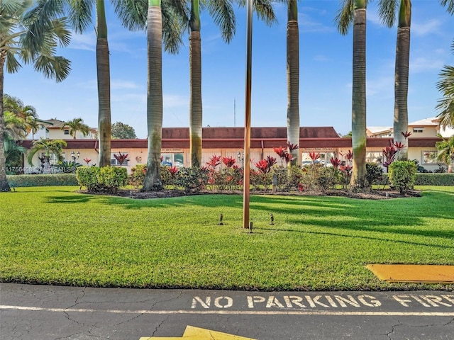 view of front of property with a front lawn