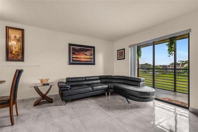 living room featuring marble finish floor