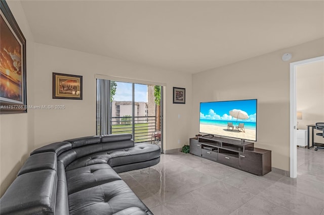 living area with marble finish floor