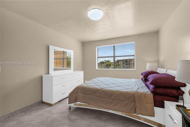 bedroom with baseboards