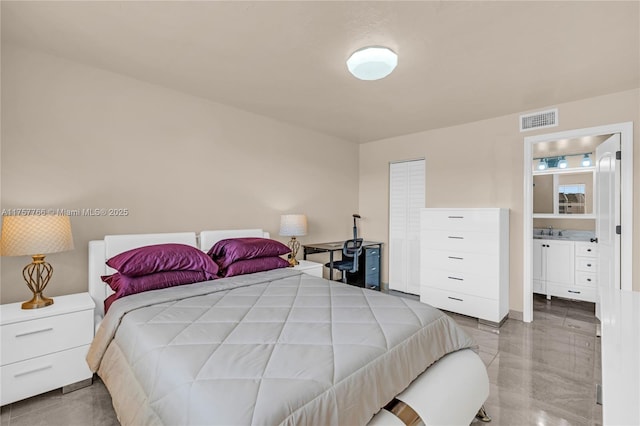 bedroom featuring a sink and visible vents