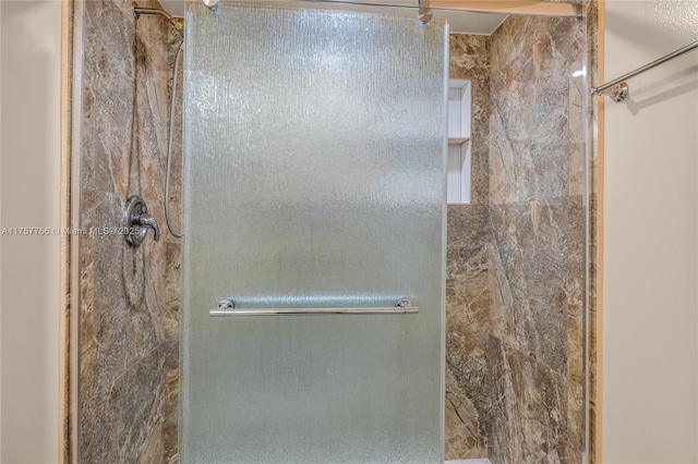 bathroom featuring a stall shower