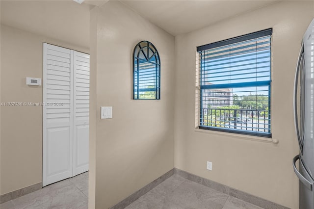 interior space with baseboards