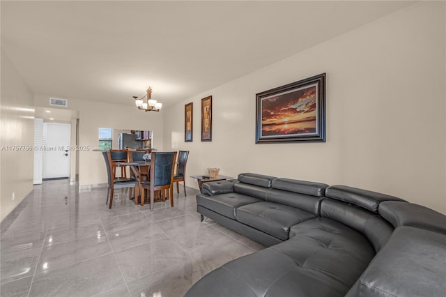 living room featuring a notable chandelier