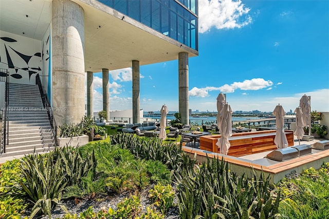 view of patio featuring a water view